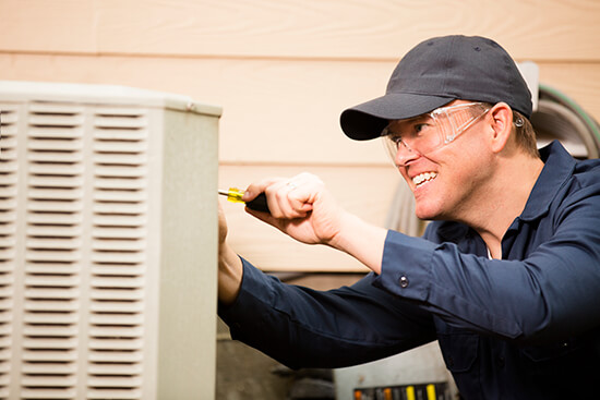 HVAC Technician Performing Routine Preventative Maintenance in Kennewick, WA